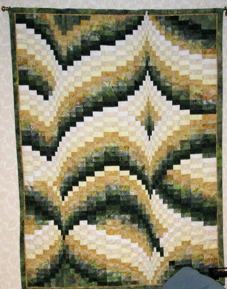  The smaller, peach quilt 